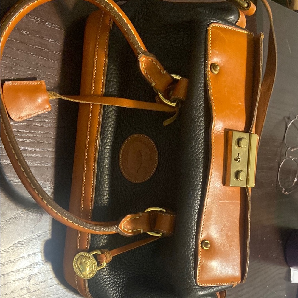 Dooney & Bourke Black and Brown Leather Shoulder Bag with Classic Silhouette